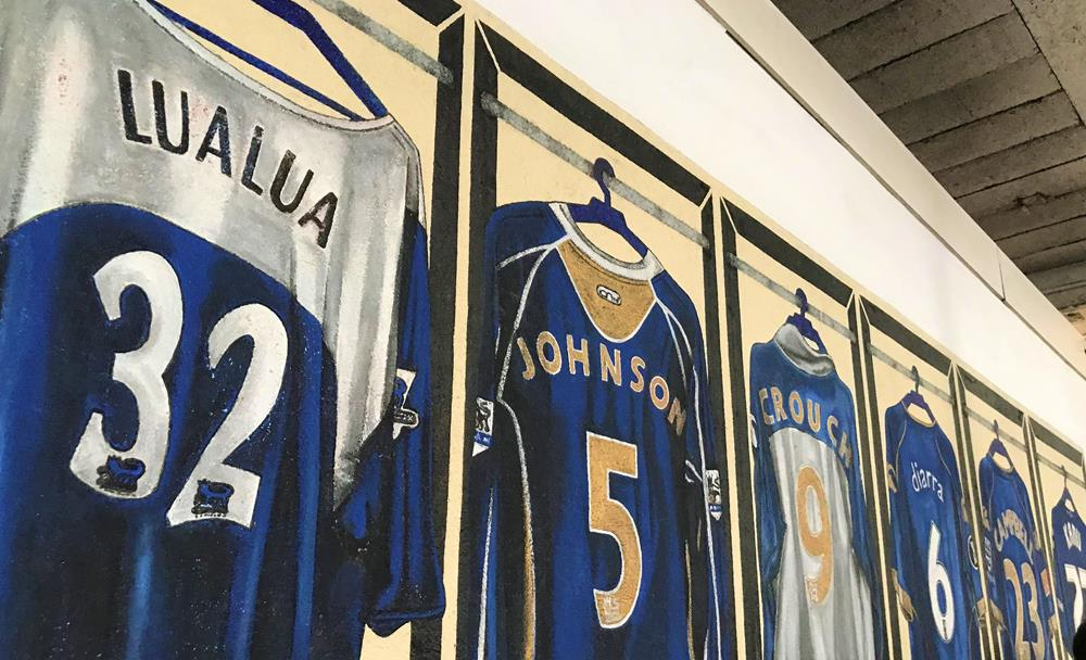 A mural featuring Portsmouth football shirts including Lomana Lua Lua, Glen Johnson and Peter Crouch, painted by Nigel Sharman AKA AceOne Designs.