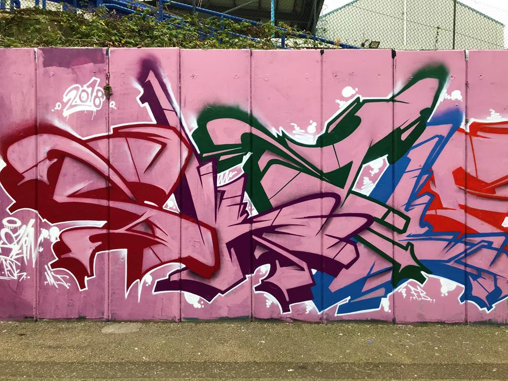A pink mural in Specks Lane, Portsmouth