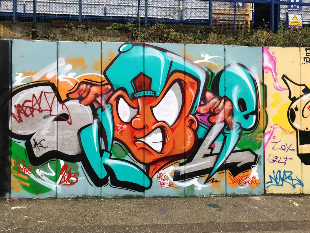Street art wall mural in Specks Lane, Portsmouth