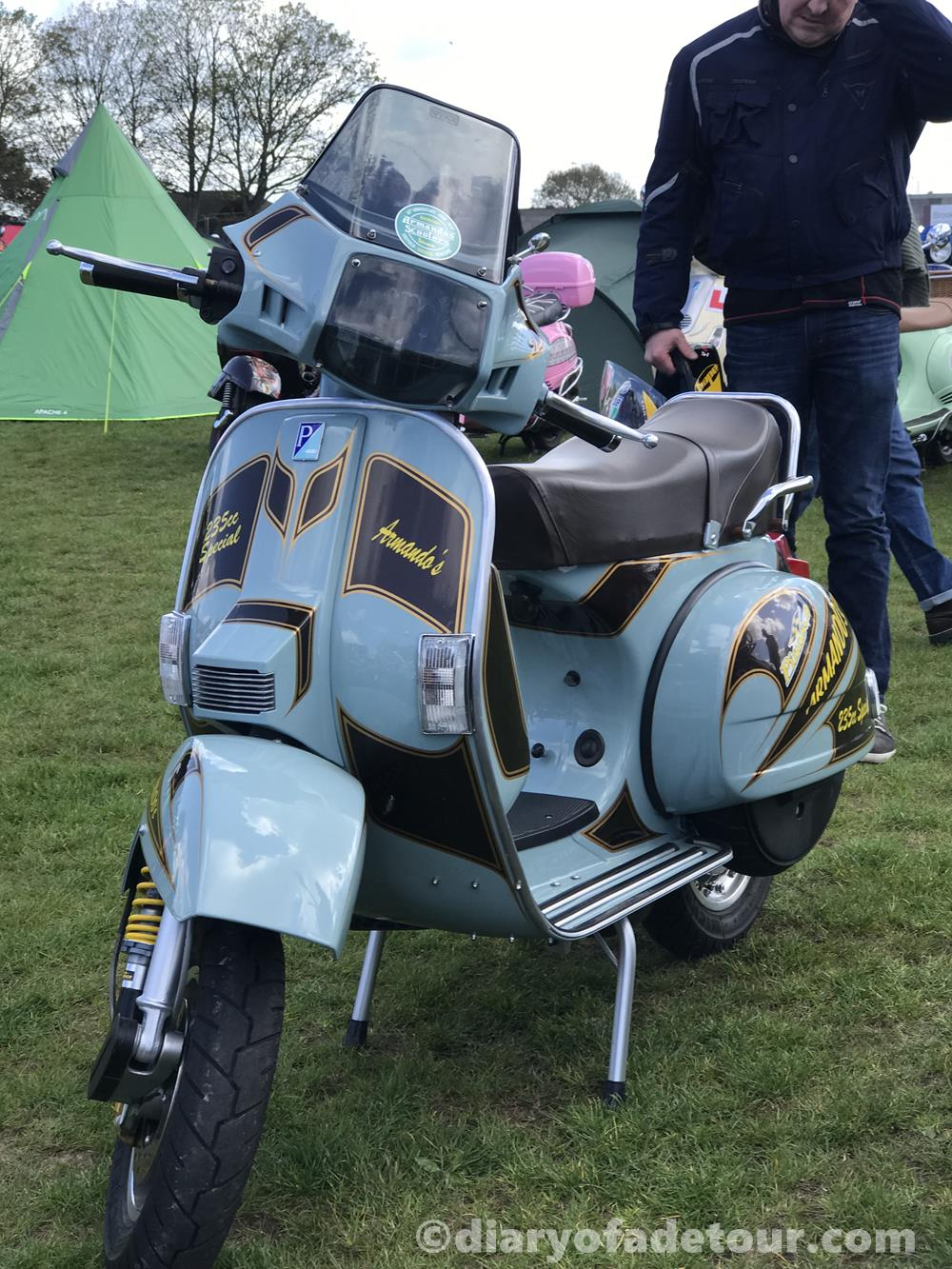 Armando's Vespa scooter with light blue and brown paint job