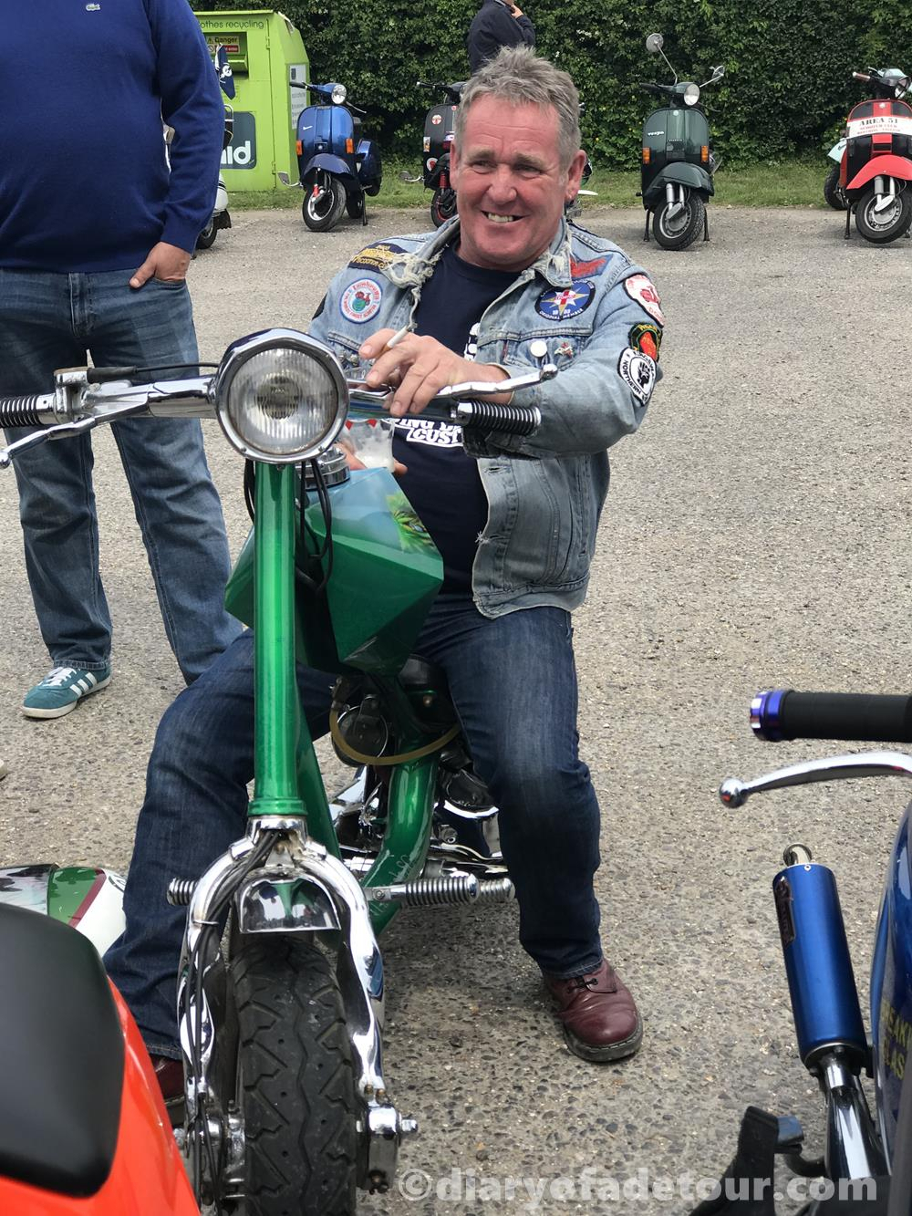 Dean Percival sitting on his Captain Pugwash custom Lambretta chopper