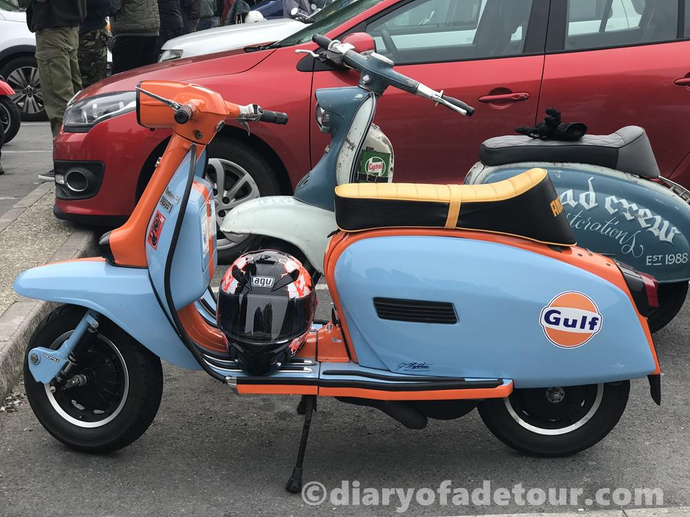 Orange and blue Lambretta with Gulf on the side panel