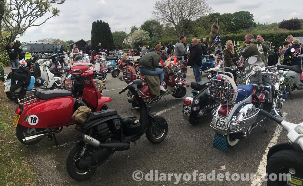Scooters parked in the car park of the Greyhound pub