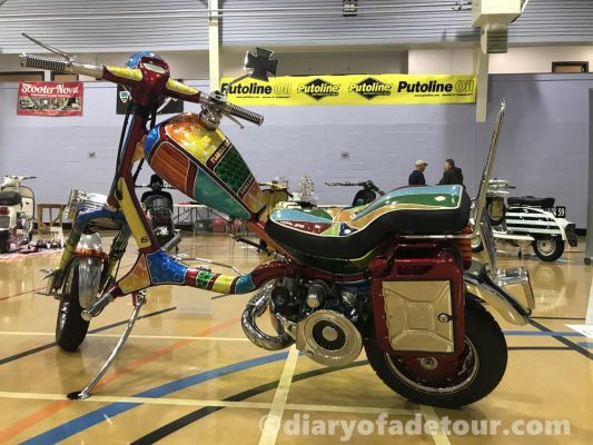 Florida-Girl-Lambretta-chopper (1) Side view of Lambretta chopper with brightly coloured paintjob by Riding Dirty Customs