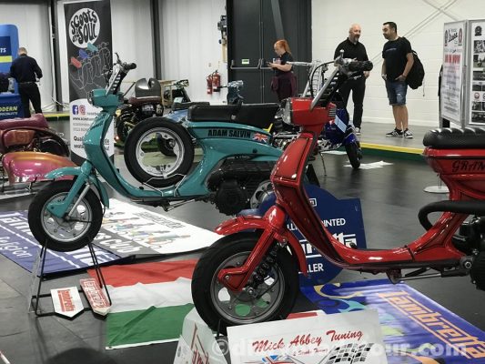 Lui-Vega-Scooter-Expo-2019 (4) Red and blue coloured Vega scooters on display at Scooter Expo