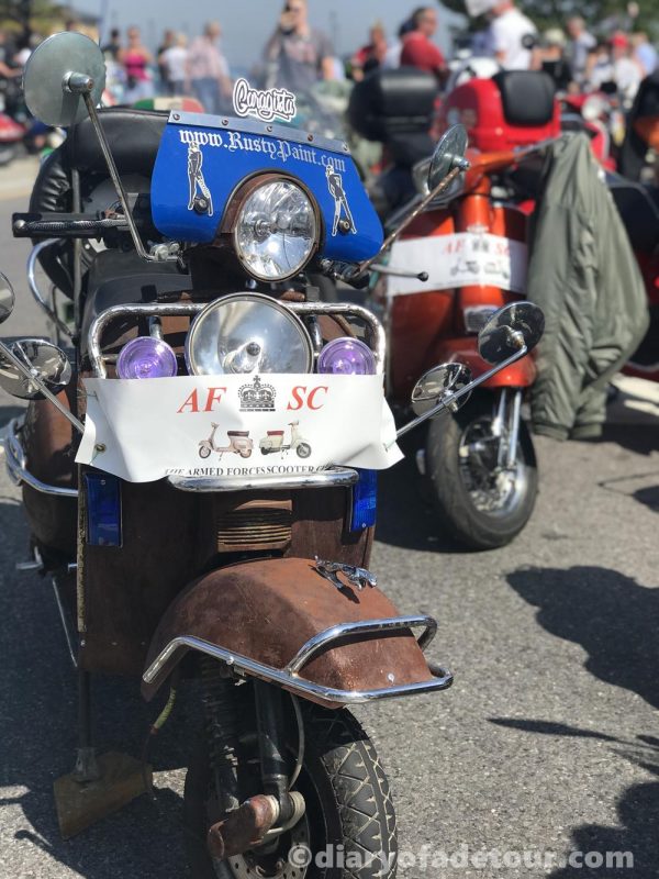 Rusty Vespa with Armed Forces SC banner on the front legshield
