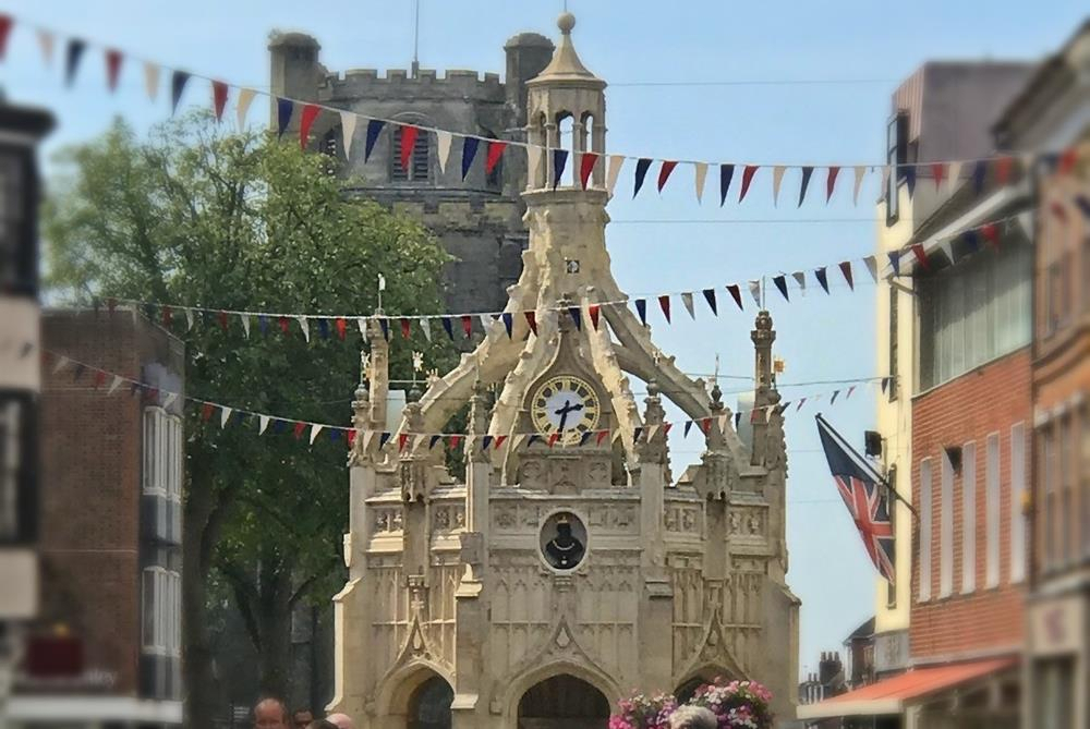 The Cross at Chichester with summer bunting