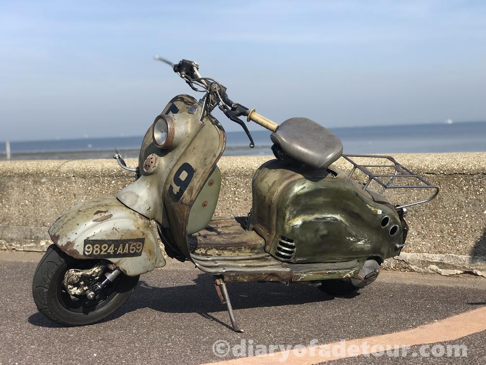 Rusty LD Lambretta on the green at Ryde at the Isle of Wight scooter rally in 2019