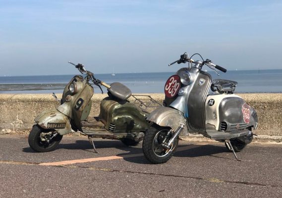 Two rusty LD Lambrettas parked on the promenade at Ryde in the Isle of Wight