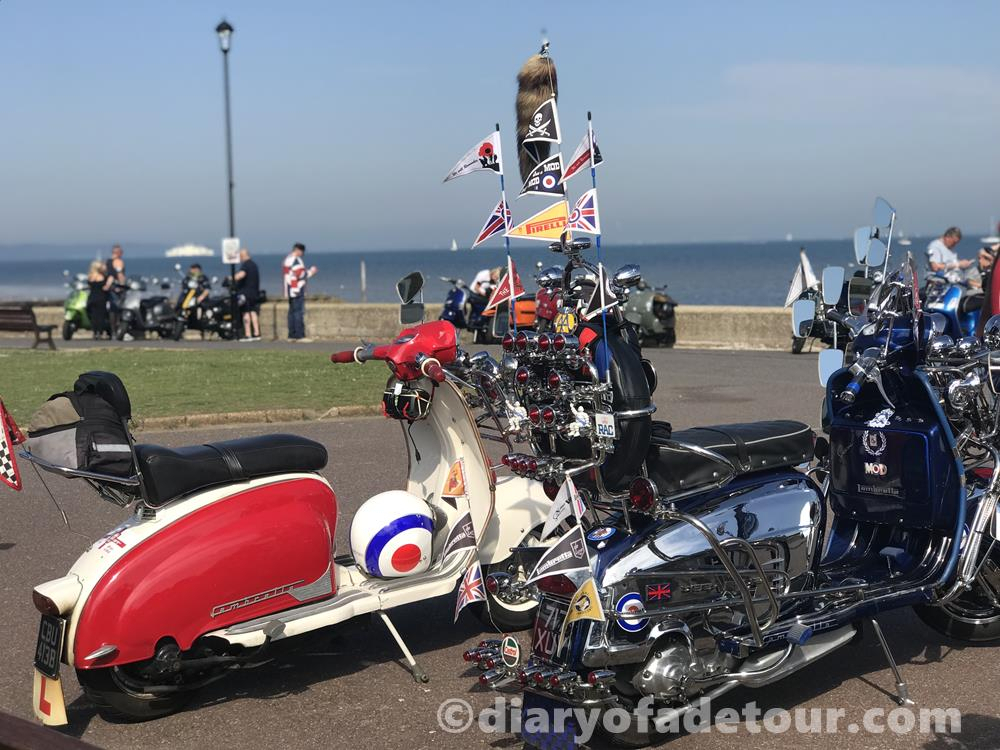 Two mod Lambrettas on the seafront at Ryde at the Isle of Wight scooter rally in 2019