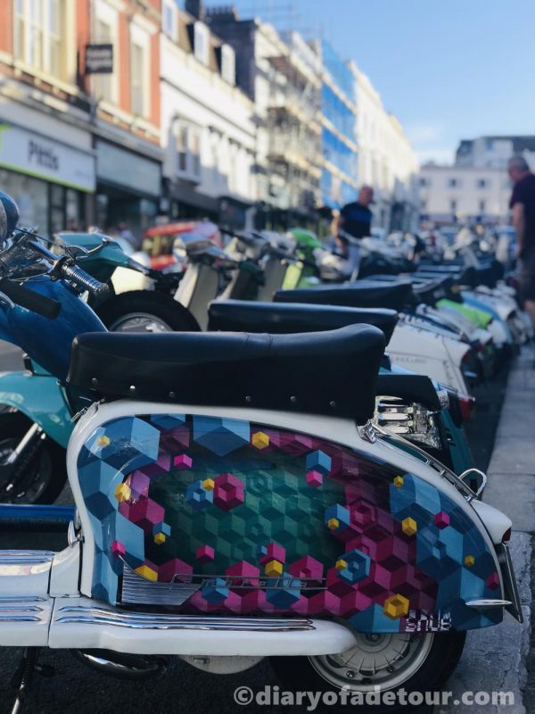 Row of scooters parked outside Yelfs Hotel in Union Street, Ryde.