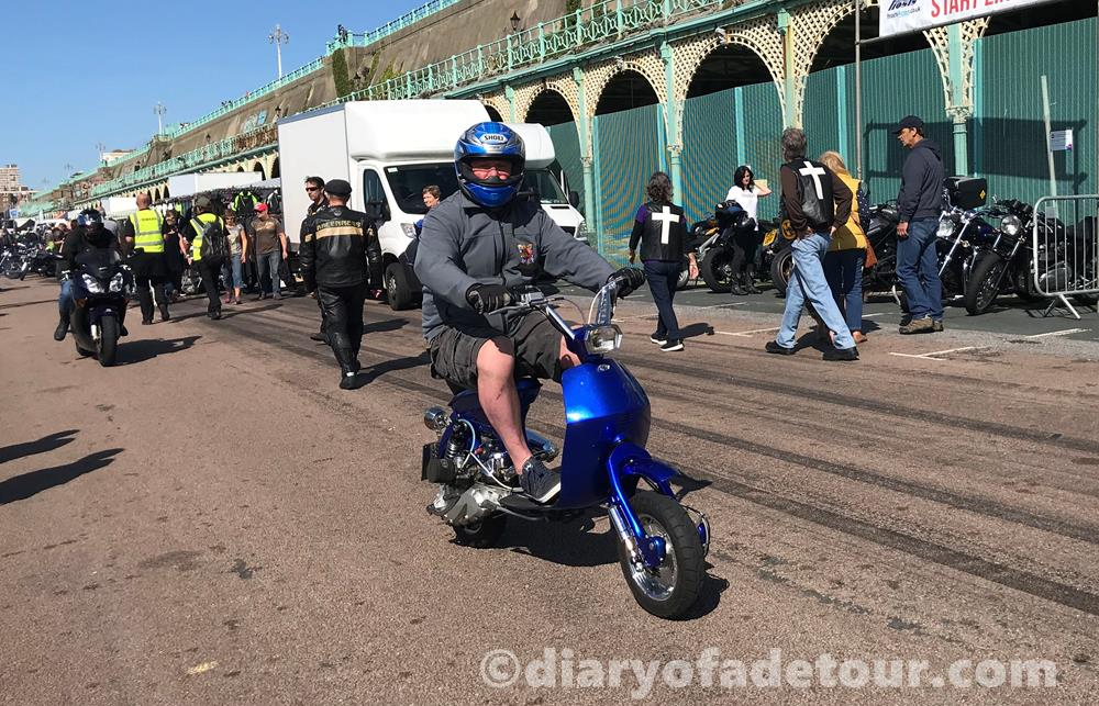 Scooterist riding a blue Vega along Madeira Drive in Brighton at the Ace Cafe Burn Up