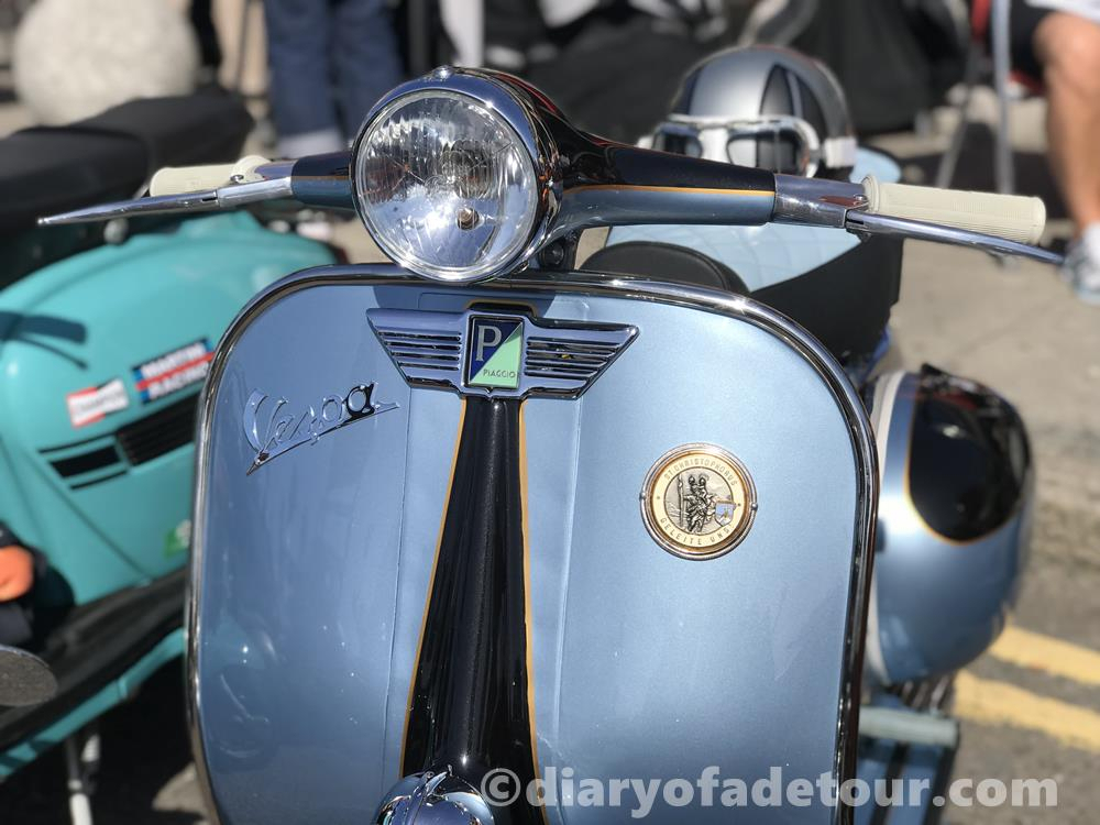 Classic Vespa parked outside Volk's bar in Brighton