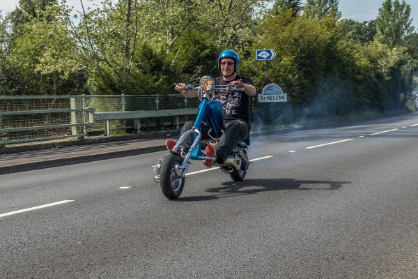 Lee Richards riding Meat Is Murder Lambretta chopper at the Isle of Wight scooter rally in 2019