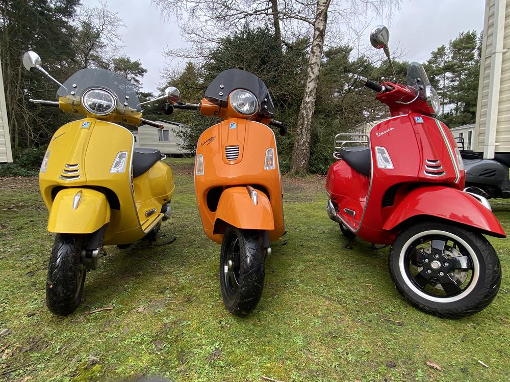 Red-Orange-Yellow-Vespa-GTS-front-view