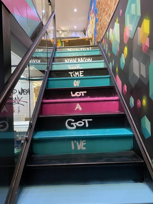 painted stairs in the basement of Bangerz and Burgerz in Brighton
