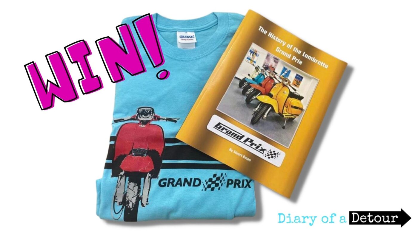 A Lambrett GP blue t-shirt with a Lambretta GP book by Stuart Owen with text overlaid saying 'WIN'.