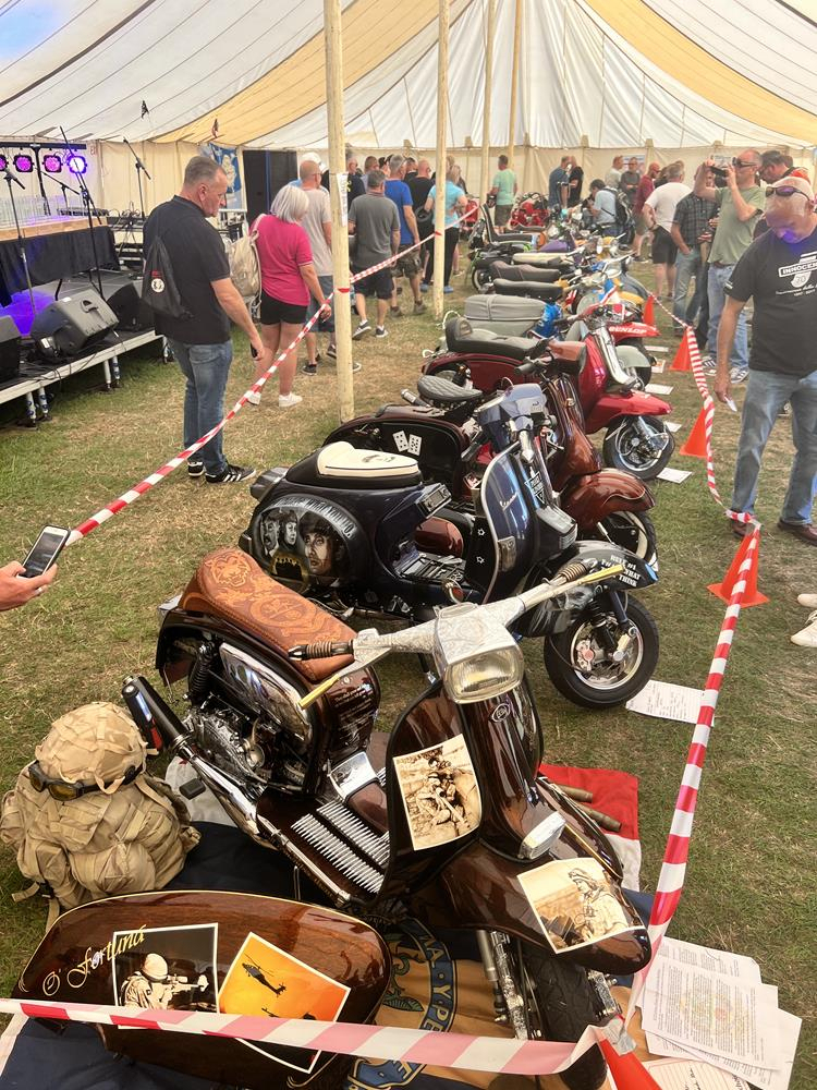 Scooters lined up in the marquee at the Isle of Wight custom show at Sandown Airport.