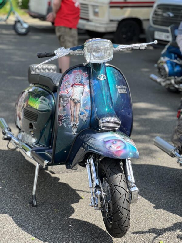 Puddin, a custom Lambretta with Harley Quinn murals and theme.