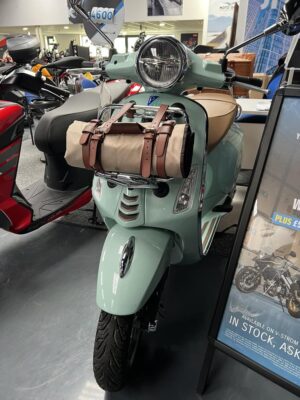 Vespa Primavera Picnic model in mint green, on show in Dearden Motorcycles showroom