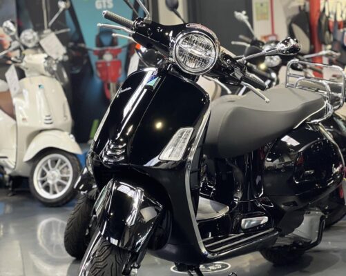 Gloss black Vespa GTS 300 HPE2 on display in the Dearden Motorcycles showroom