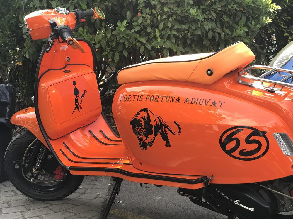 Orange Scomadi scooter