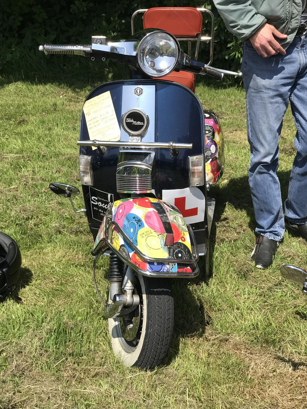 Vespa PX scooter with northern soul wraps on the front mudguard